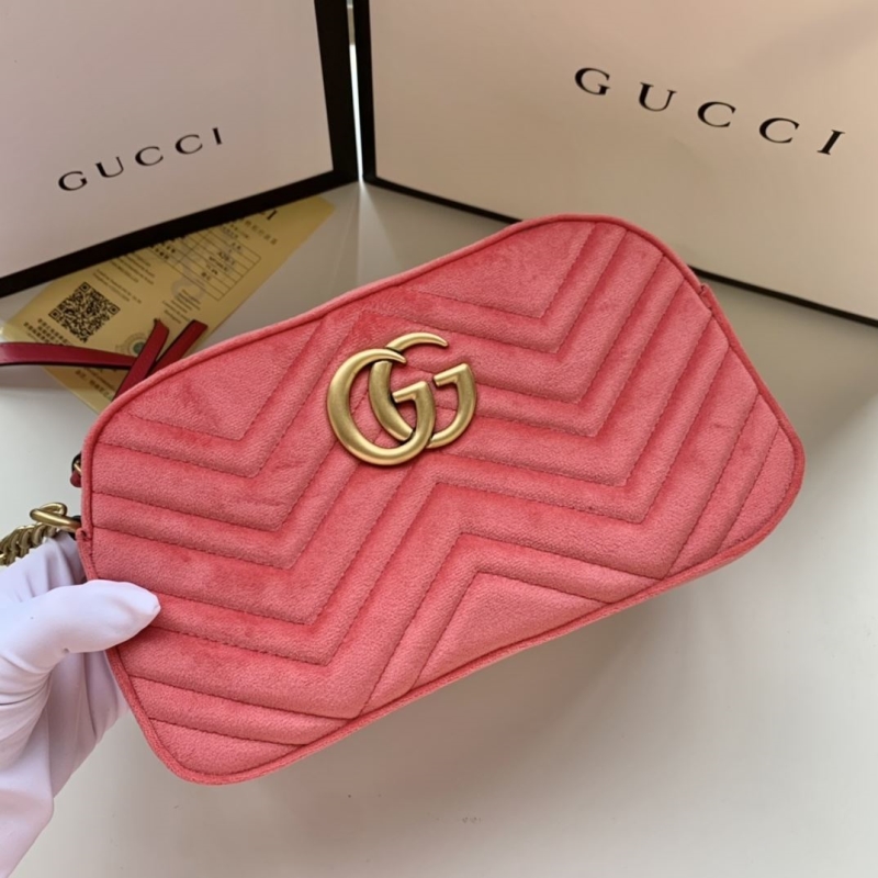 G*u*i clutch bags